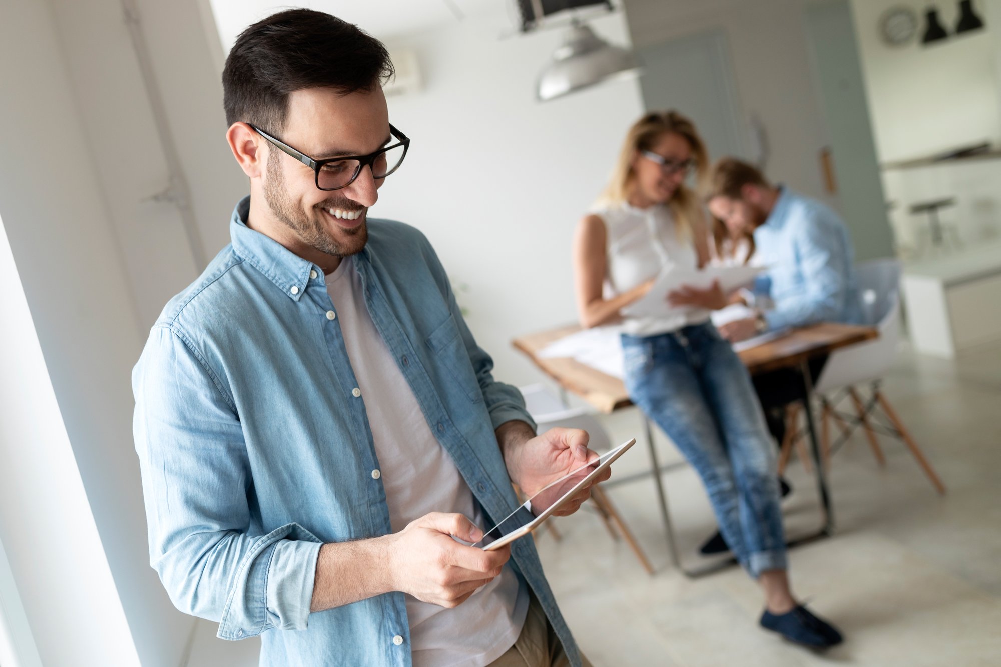 tablet smiling work team